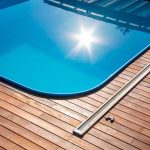 ipe wood decking surrounding a swimming pool